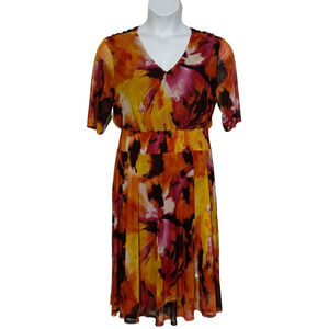 Women's size large red multi colored short sleeve lined knee length dress